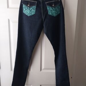 Dereon (discontinued) Jean's with Aqua Fleur-de-lis pockets.